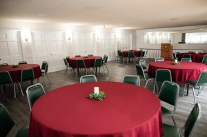 banquet setting with red table cloth